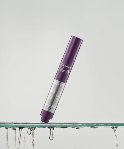 Dr. Groot Scalp Revitalizing Hair Thickening Roll-On Serum in a luxurious shelf setting for a revitalized scalp and fuller hair